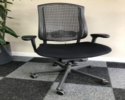 Herman Miller Celle office chair with pneumatic cylinder for adjustable comfort.