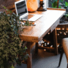 Sustainable workspace setup featuring eco-friendly furniture, greenery, and natural decor for a gree.