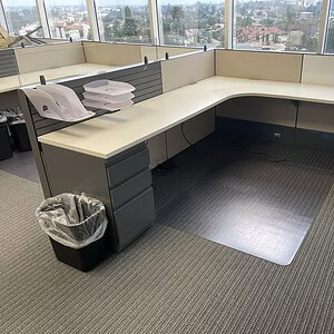 Modern Haworth Compose 7'x8' office desk with 49" glass panels for workspace elegance.