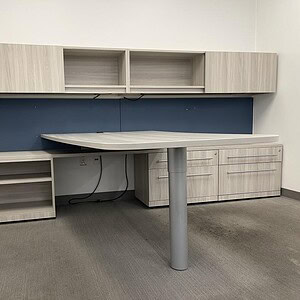 Modern Haworth Phantom Grey private office with custom storage solutions.