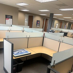 Frameless glass office partitions for modern workspace design at Cube World USA.