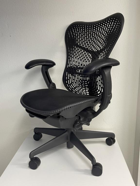 Herman Miller Mirra black seat graphite frame