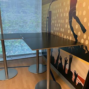 Modern black bar height square table for office or lounge areas.