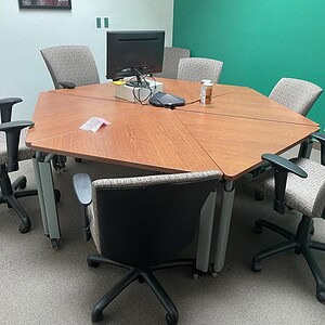 Teknion 7' Hexagon Conference Table in modern office setting.