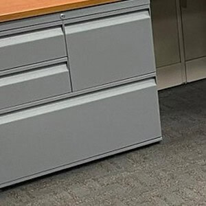 Storage combo file cabinet in Teknion grey, 30 inches wide, ideal for office organization.