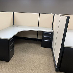 Herman Miller A02 6x6 beige and black office cubicle with privacy panels.