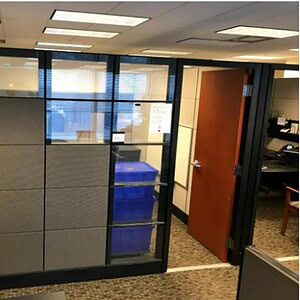 Office cubicle with Herman Miller Ethospace door and fabric panels.