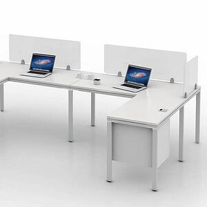 Office desk with privacy panels and dual laptops for collaborative workspace.