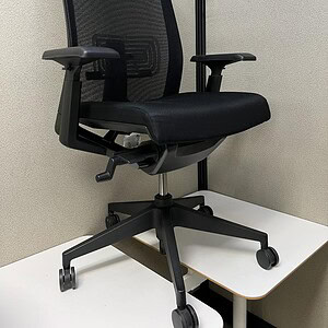Haworth Very Fully Loaded Black Task Chair for ergonomic office comfort and support.