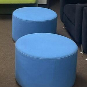 Sky blue round Ottoman by Steelcase Turnstone, perfect for modern office decor.