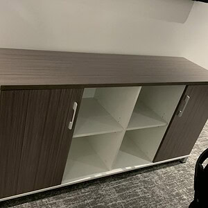Modern credenza with driftwood finish and white open shelving, ideal for contemporary living or offi.