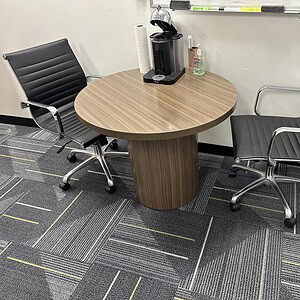 Round Steelcase Big Base Espresso Table for Office Spaces.