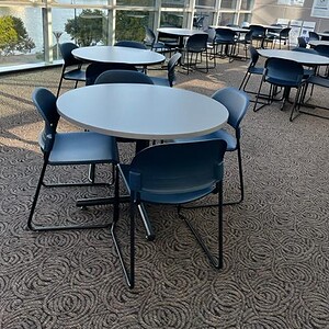 Eames 36" breakroom tables with modern design, perfect for office dining or casual meetings.