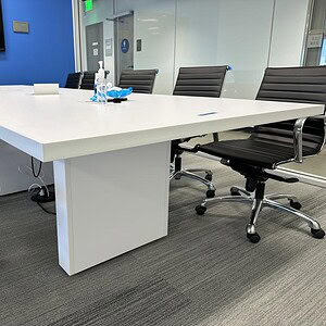 Enwork Artic White 8' modern thick conference table in a professional office setting.