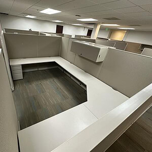 Office cubicles for workspace organization and privacy.