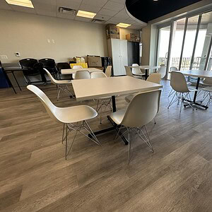 Refurbished Herman Miller Eames Style Tables 3'x3' in a contemporary office setting.