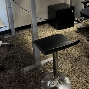 Height adjustable grey-silver P shape desk for ergonomic workspace solutions.