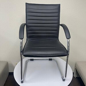 Boss Chrome Frame Black Vinyl Side Chair for modern office decor.