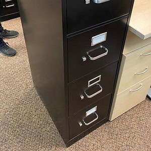 Hon Black 4 Drawer Vertical File Cabinet for office storage and organization.