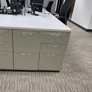 Custom triple storage pedestal with white top for office organization.