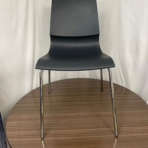 Black Ricciolina chair by Marco Maran for contemporary interior design.