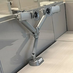 Dual monitor arm for ergonomic desk setup and improved productivity. Fits USB and power cables, idea.