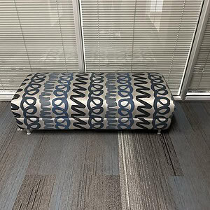 Elegant silver and blue patterned ottoman bench for living room or office decor.