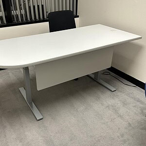 Grey HAT P-shaped desk with 6x30 dimensions for office use.