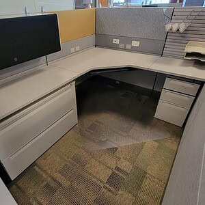 Modern 6x7 ft black and gold office cubicle with storage and privacy panels.
