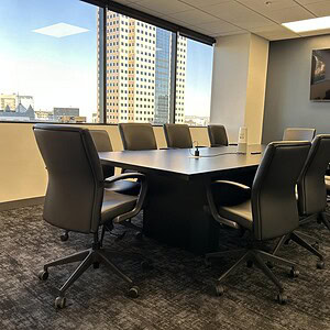 Phantom Black Steelcase 10' electric conference table in a modern office setting. Perfect for meetin.