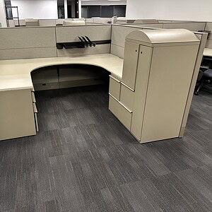 Office cubicle with Knoll Reff 8x8x49T, beige fabric panels, and built-in storage. Perfect for moder.