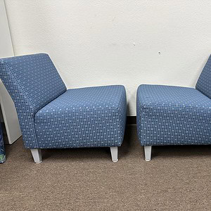 Pair of Hon Blue modular lounge chairs with modern design and comfortable upholstery.