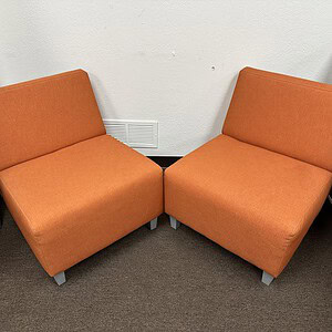 Orange modular sofa lounge chair for modern living spaces. Perfect for relaxation and stylish interi.