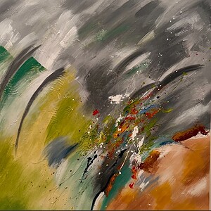Colorful abstract stone art with orange, grey, and green hues.