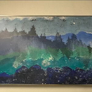 Large 72"x36" Frozen Forest canvas print with icy trees and mountain backdrop.
