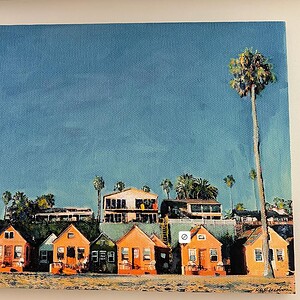 Vibrant 36x50 California Breeze wall art featuring colorful houses and palm trees, perfect for moder.