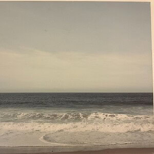 Vibrant Pacific Ocean canvas wall art showcasing waves and horizon, perfect for coastal home decor.