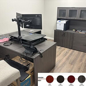 Modern Napa 6'x6' Slate Grey desk with storage cabinet in office setting.