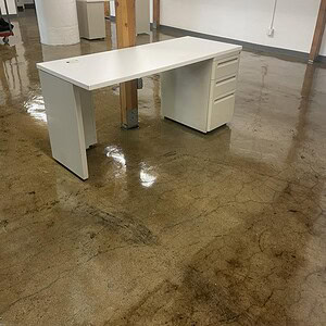 Herman Miller freestanding desk in white, ideal for modern office spaces. Customizable sizes for erg.