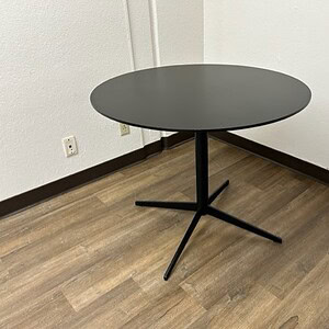Black accent table for living room or office decor.
