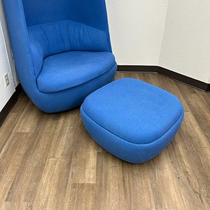 Blue Hightower Gimbal high back chair without ottoman for modern lounge spaces.