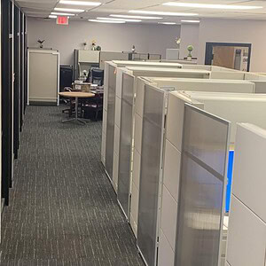 Herman Miller Ethospace 70-inch workstation with sliding door in office.