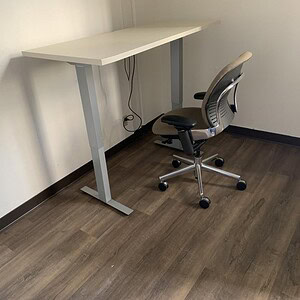 AMQ 5 or 6 foot height adjustable desk for ergonomic workspace setup.