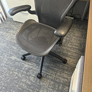 Aeron by Herman Miller size C ergonomic office chair with adjustable arms and mesh backrest. Perfect.