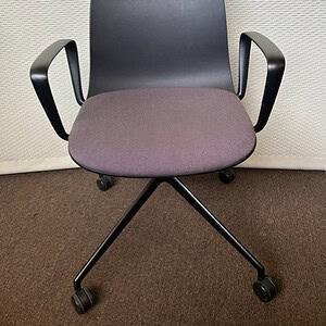 Black and grey guest or conference chair with ergonomic design for office or meeting rooms.