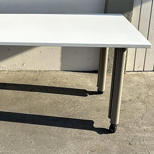 Modern white Knoll mobile conference table 6x30 for office meetings and collaboration.