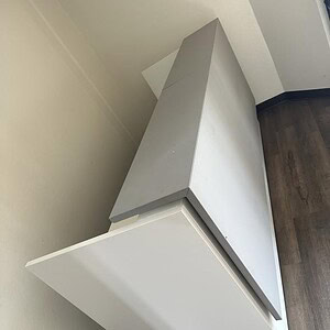 Modern illuminated reception desk with sleek design and integrated lighting. Perfect for contemporar.