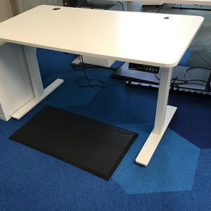 Adjustable smart desk with height control, 53x29 inches, ideal for ergonomic office setups.
