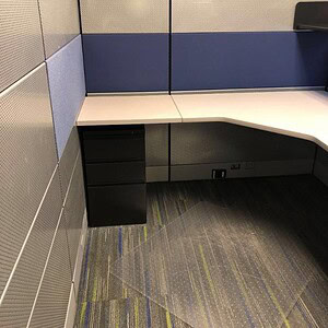 Ethospace perforated Herman Miller 62" desk in modern office setting.