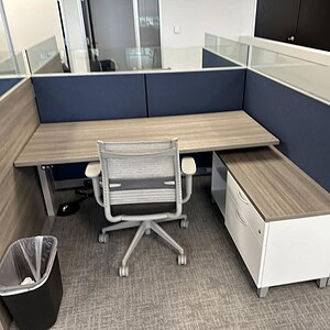Allsteel cubicle with frameless glass walls, 6x5x50 size, ideal for modern office spaces.